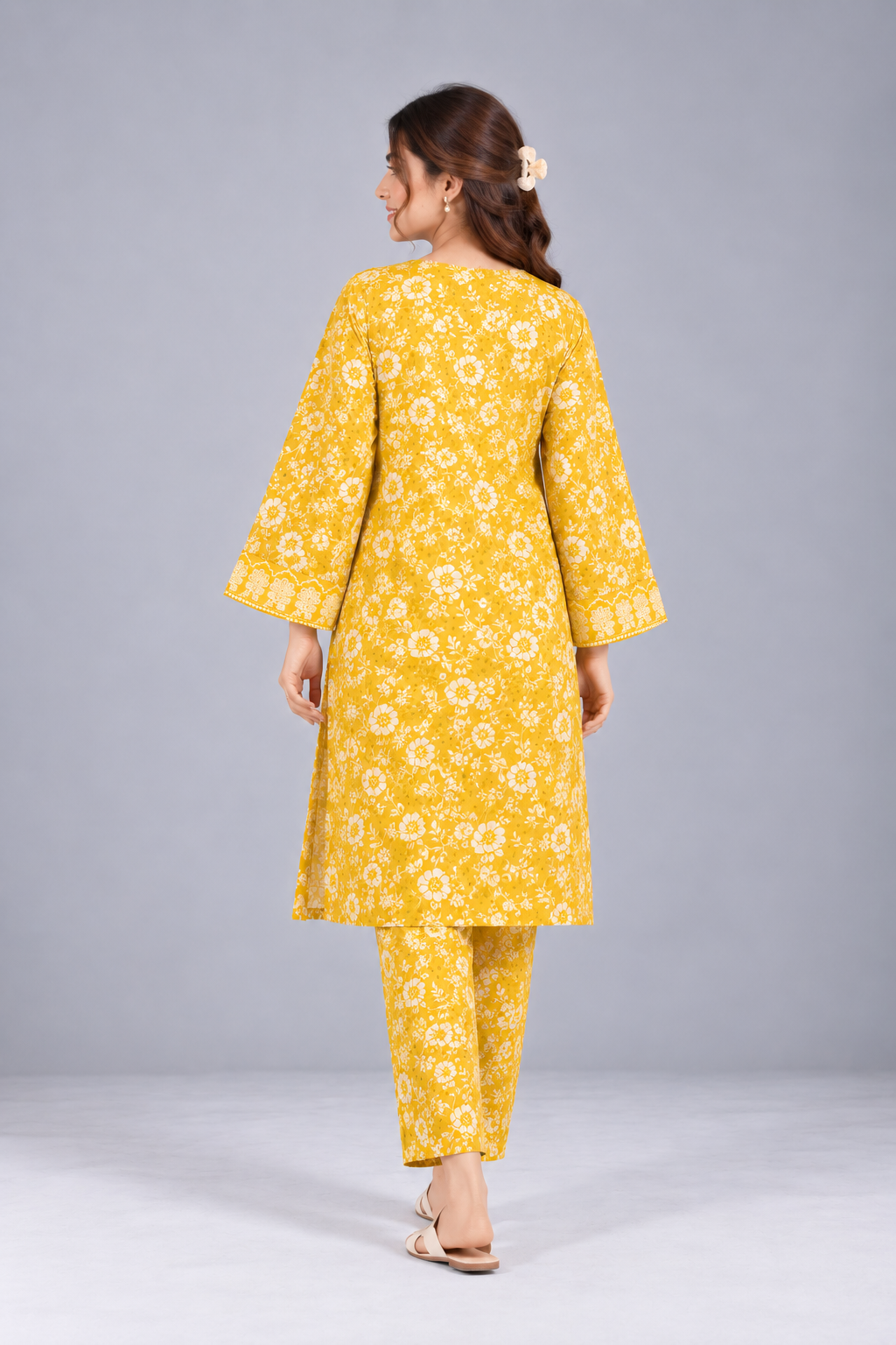 Edenrobe yellow floral printed co-ordset for women, back view with matching shirt and trousers.