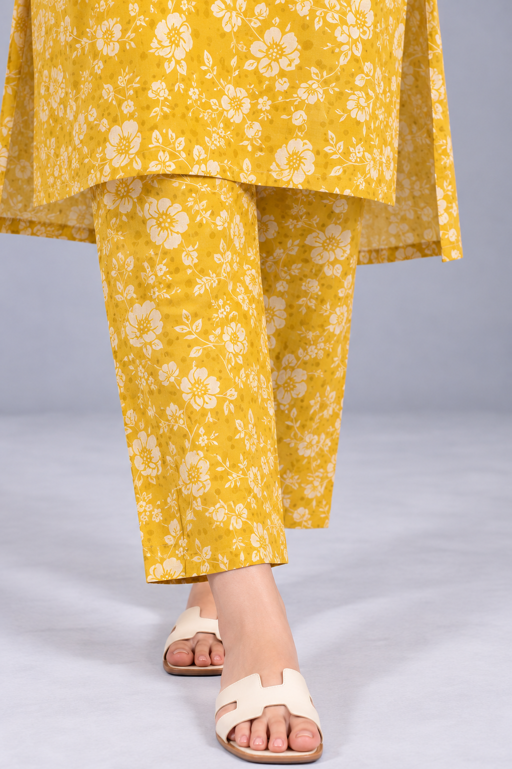 Edenrobe yellow floral printed trousers with matching white floral pattern.